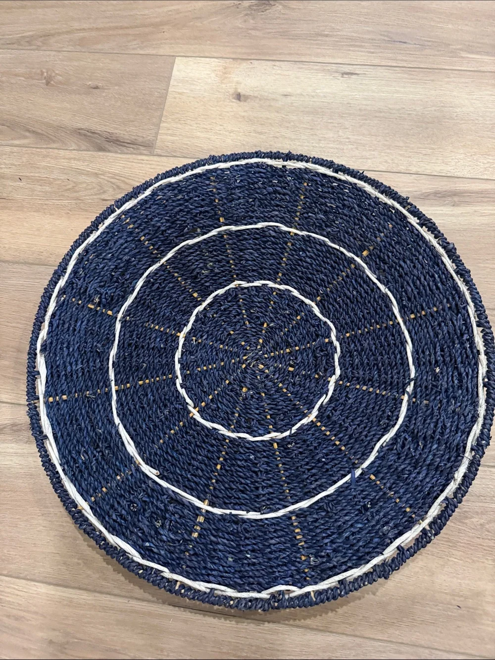 Handwoven Navy and White Round Seagrass Accent Wall Hanging.